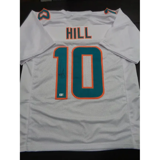 White Tyreek Hill Miami Dolphins autographed jersey with teal and orange accents