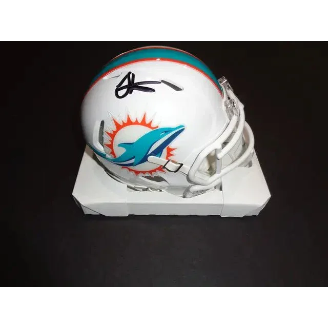 White Miami Dolphins mini helmet with Tyreek Hill autograph and COA for Miami Dolphins fans