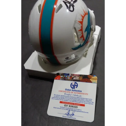 White Miami Dolphins helmet signed by Tyreek Hill with COA, perfect for Miami Dolphins fans