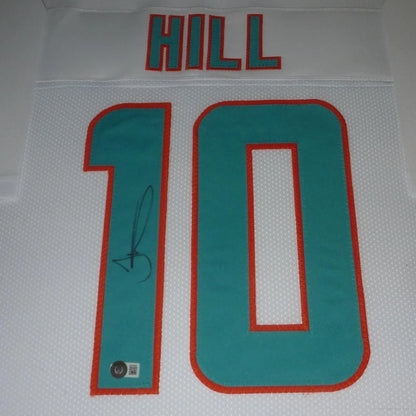 Framed Tyreek Hill Miami Dolphins signed jersey in teal and white