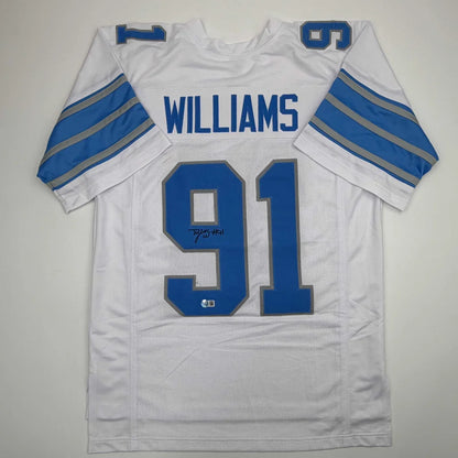 White and blue custom jersey with Williams 91, NFL logo, Detroit Lions colors