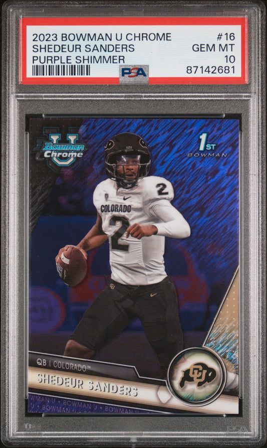 PSA-graded trading card in clear case showing Colorado quarterback Shedeur Sanders in white jersey holding football against blue background with red label and grade 10.