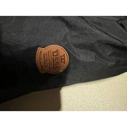 Black D-555 Ski Jacket with brown stitched leather patch for winter adventures