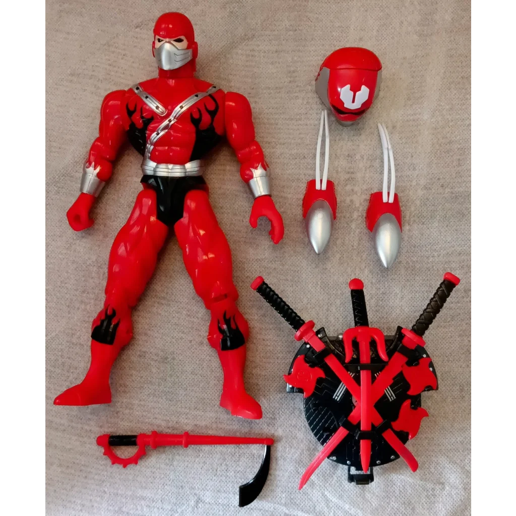 Vintage Ultimate Ninja red action figure with black accents and battle accessories