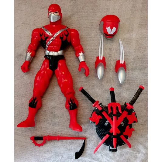 Vintage Ultimate Ninja red action figure with black accents and battle accessories