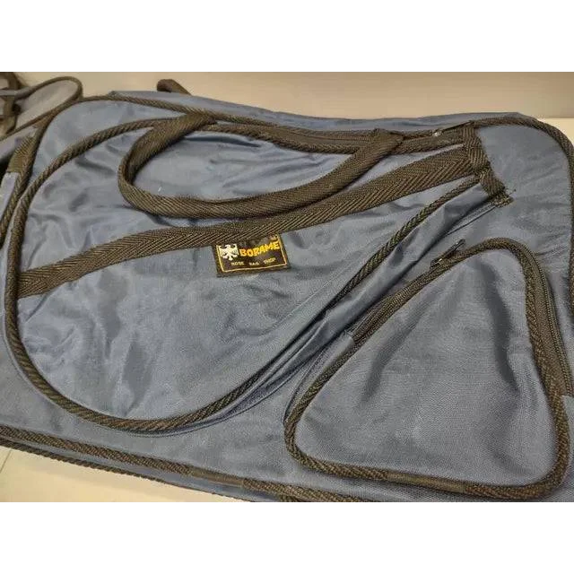 Blue borame tennis racket duffle bag with black straps and small zip pocket