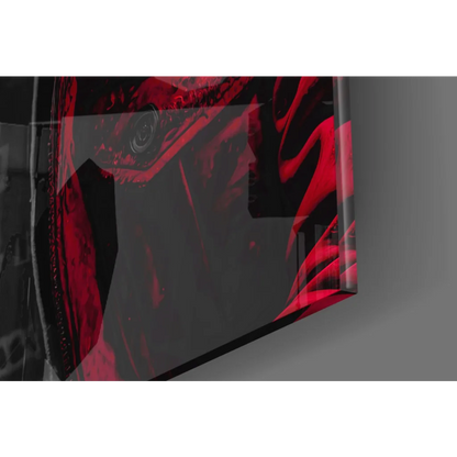 Glossy black and red abstract glass wall art with swirling patterns
