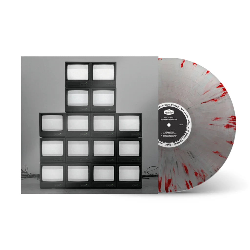Grey vinyl record with red splatter design and Val Halvorson album cover of TVs