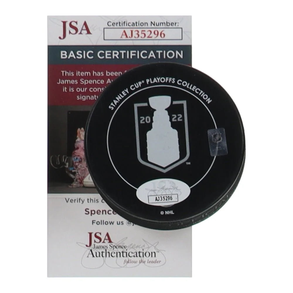 Black Stanley Cup Champions logo hockey puck with JSA certification sticker and 2022 playoffs