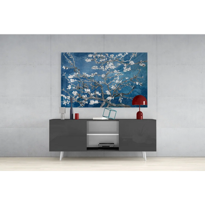 Vibrant blue Van Gogh Almond Blossom glass wall art above gray console