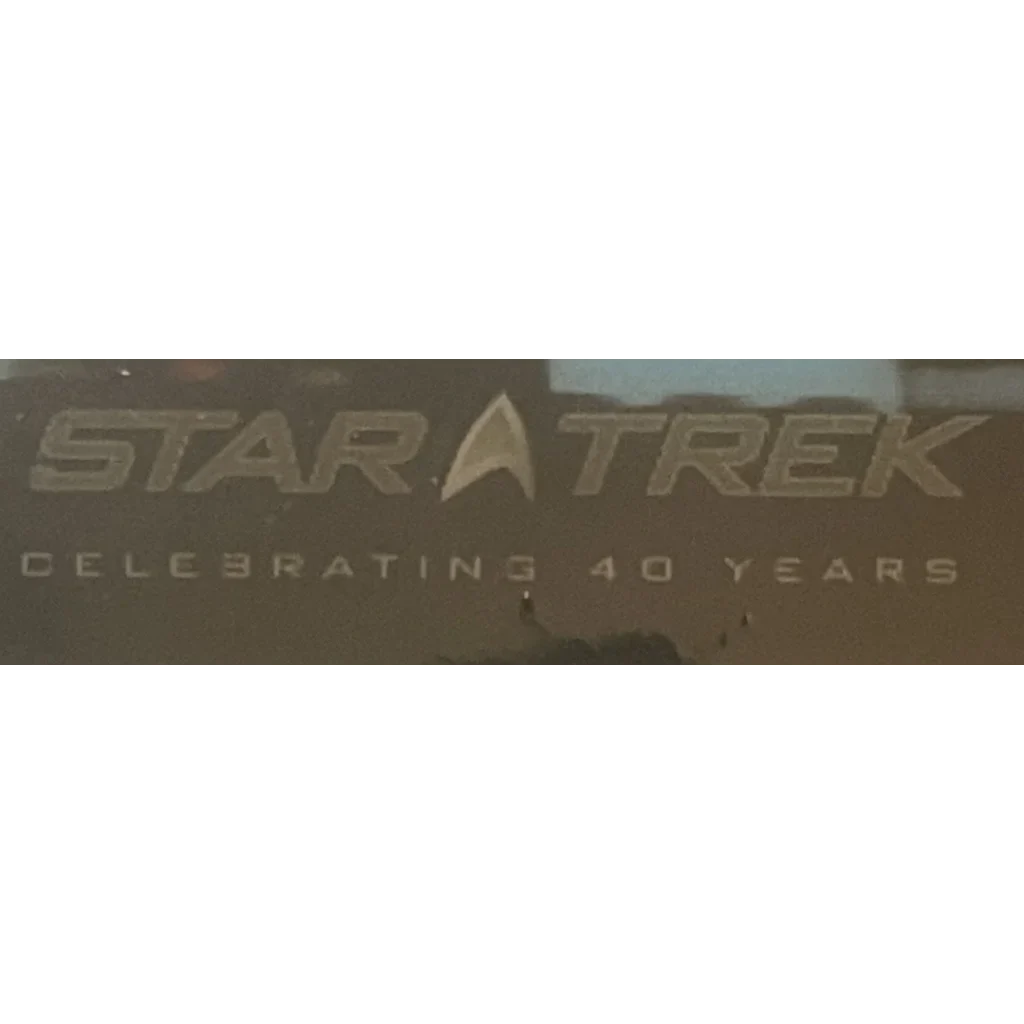 Text banner reading STAR TREK CELEBRATING 40 YEARS with the Star Trek delta insignia