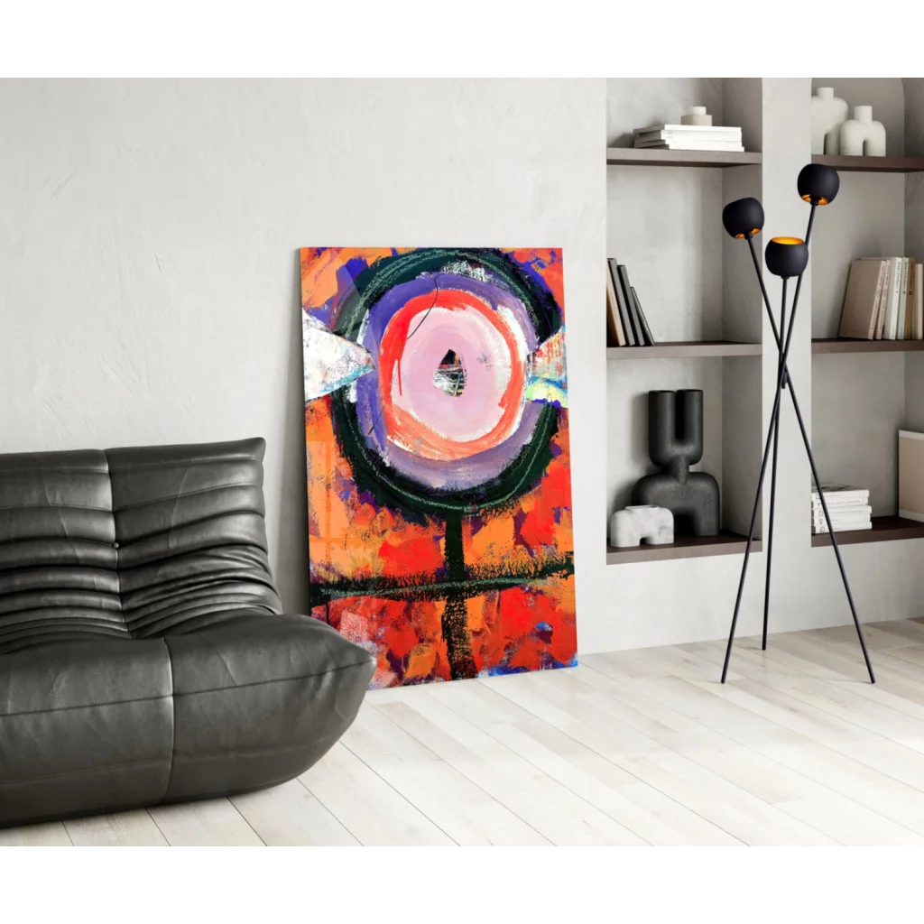 Modern black leather sectional sofa under vibrant abstract wall art