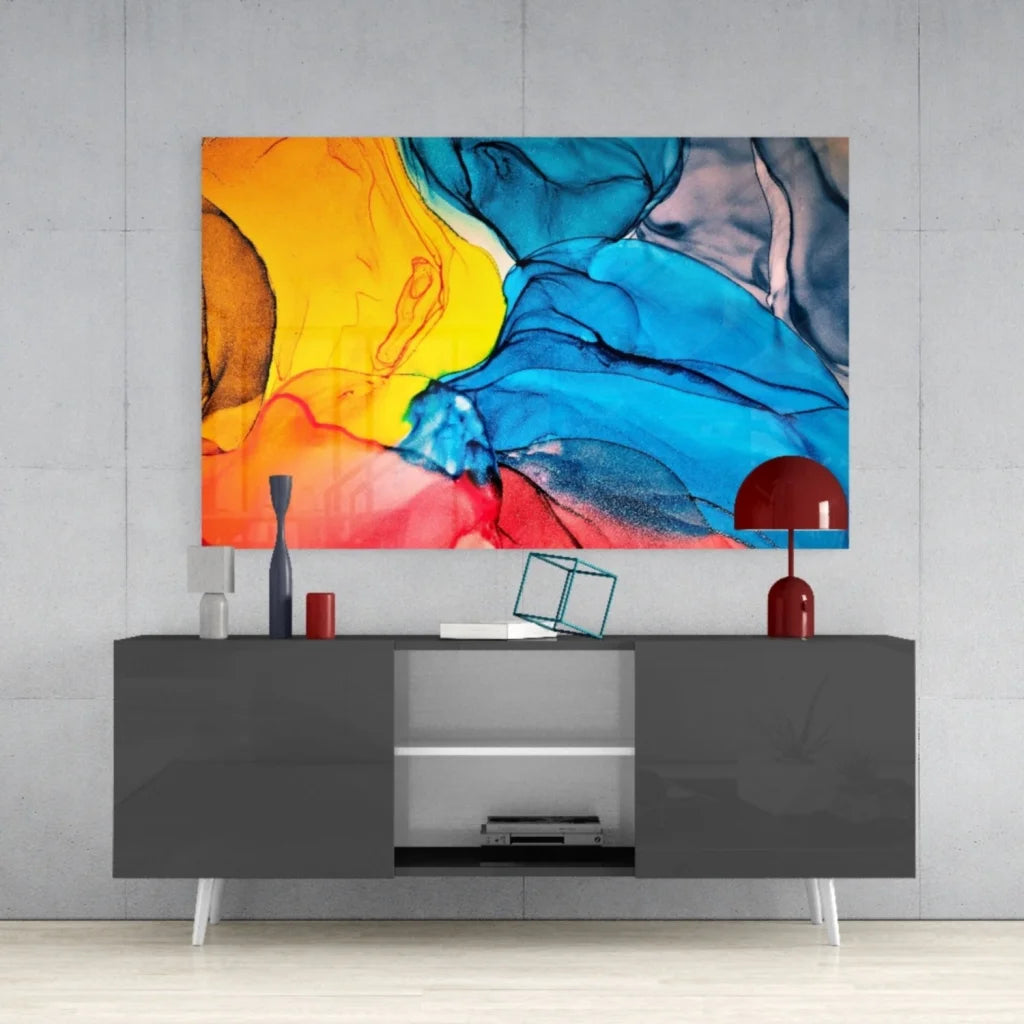 Modern gray sideboard with white legs under vibrant abstract wall art