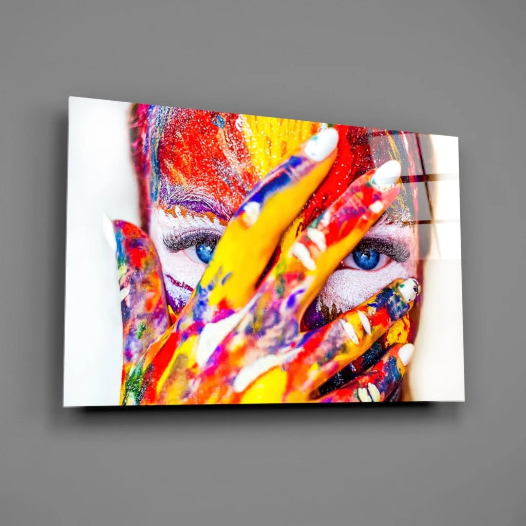 Vibrant abstract face wall art with colorful handprints