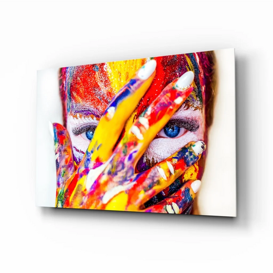 Vibrant abstract face wall art with colorful handprints