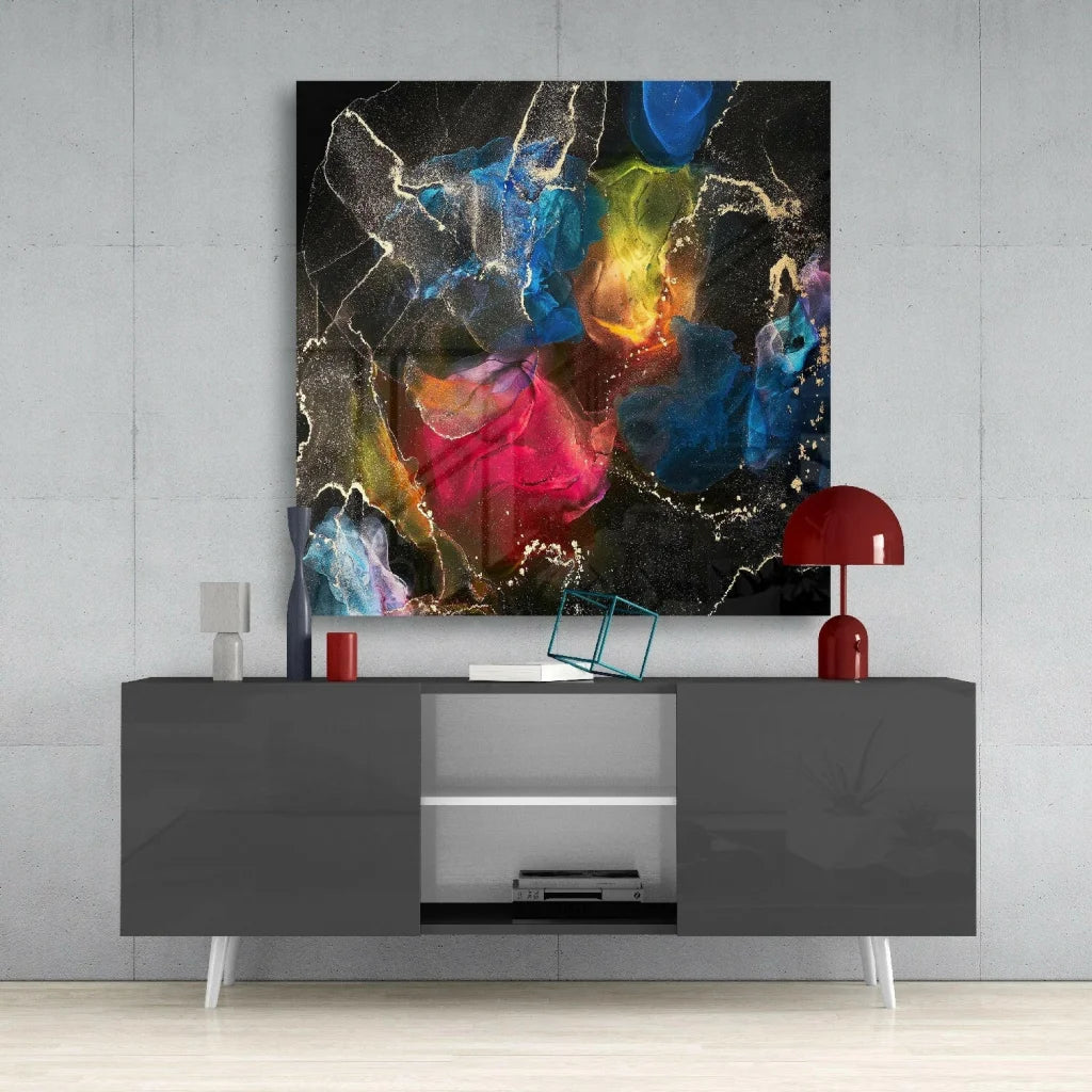 Modern black and white sideboard with sleek legs and vibrant glass wall art
