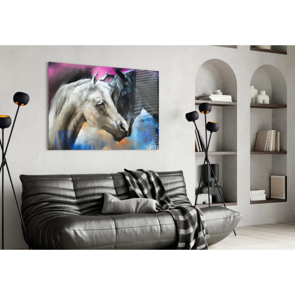 Black leather sofa with plaid throw and vibrant abstract horses glass wall art
