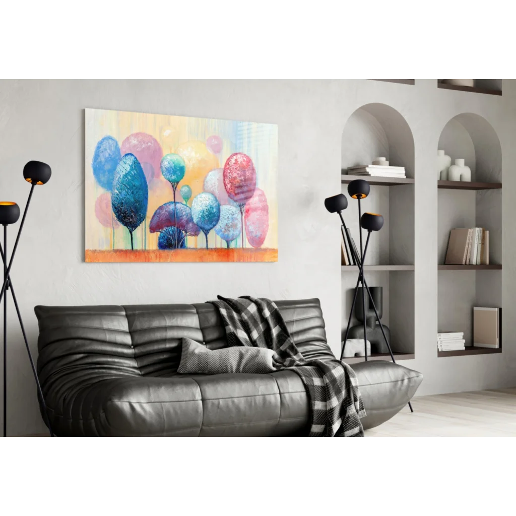 Leather sofa with checkered blanket near vibrant abstract tree glass wall art