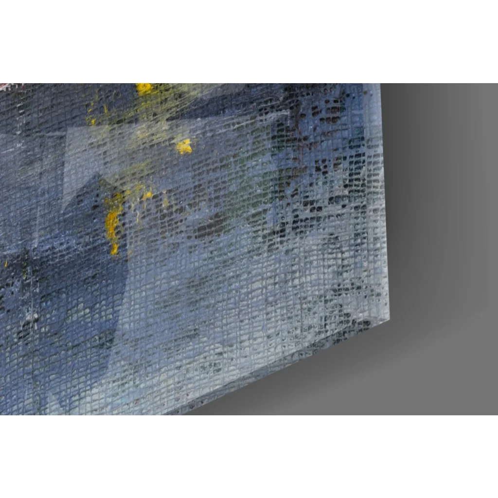 Abstract wall art with textured gray blue hues and bold yellow splashes