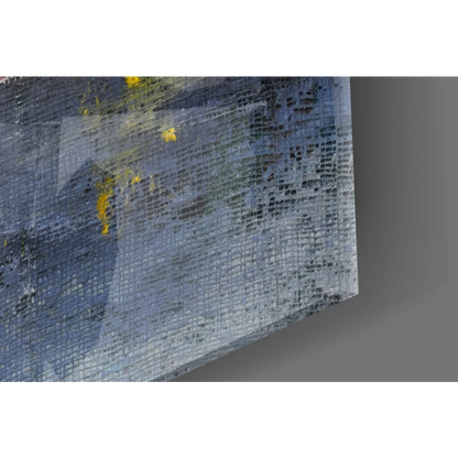 Abstract wall art with textured gray blue hues and bold yellow splashes