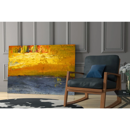 Modern rocking chair with blue cushions near vibrant blue wall art