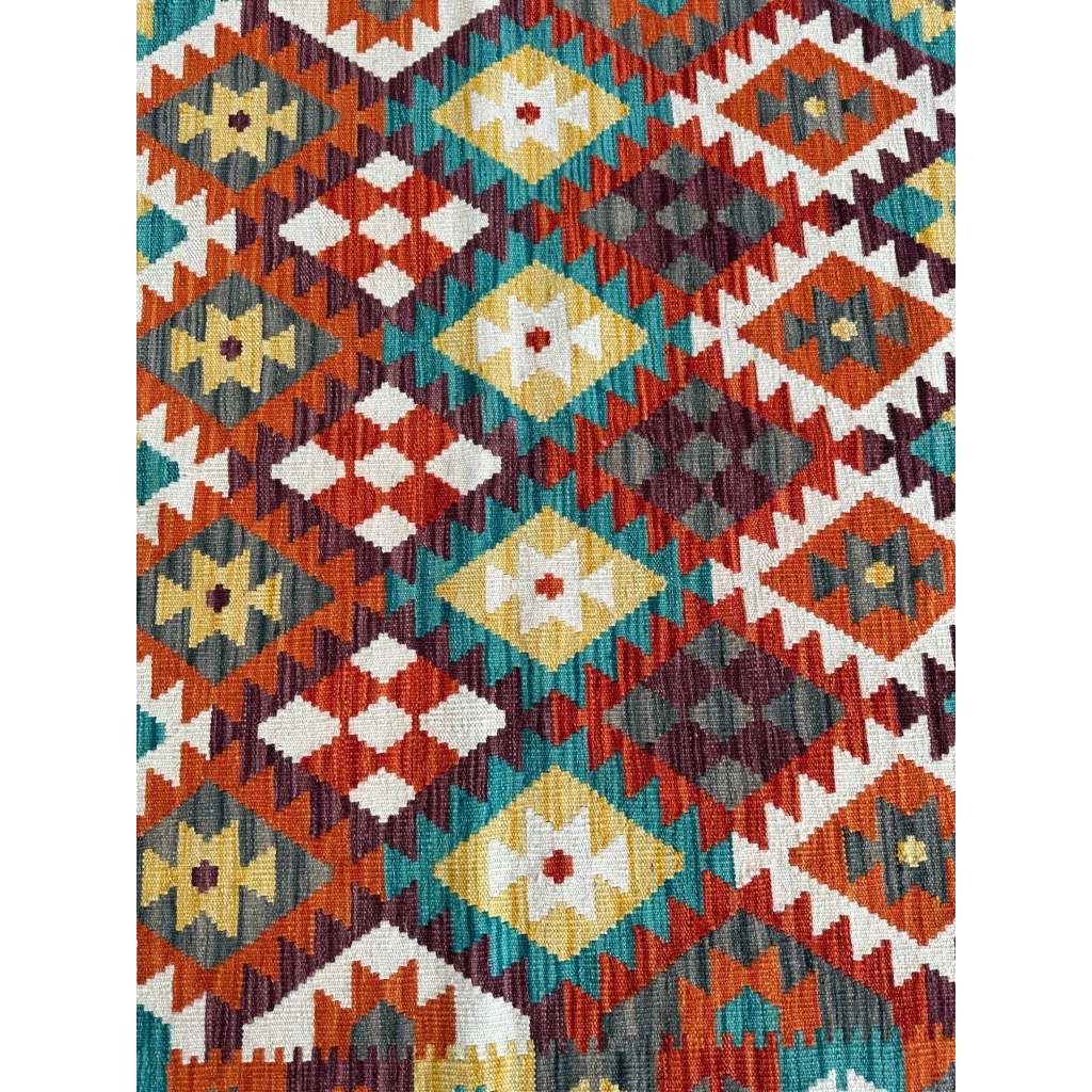 Vibrant Afghani chobi kilim rug with bold orange teal diamond motifs