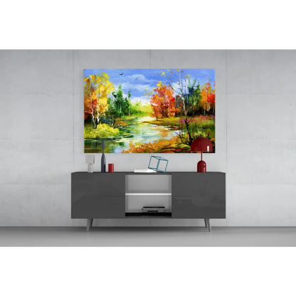 Modern gray sideboard with glossy silver legs under Vibrant Autumn River wall art