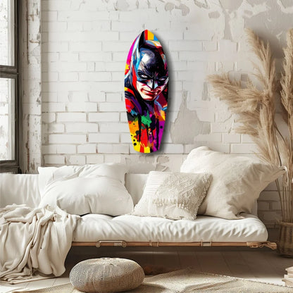 Vibrant Batman portrait tempered glass art on white brick wall