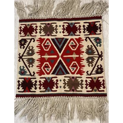 Bulgarian Kilim rug, full view, bold red geometric patterns and fringe edge, hand-made natural wool