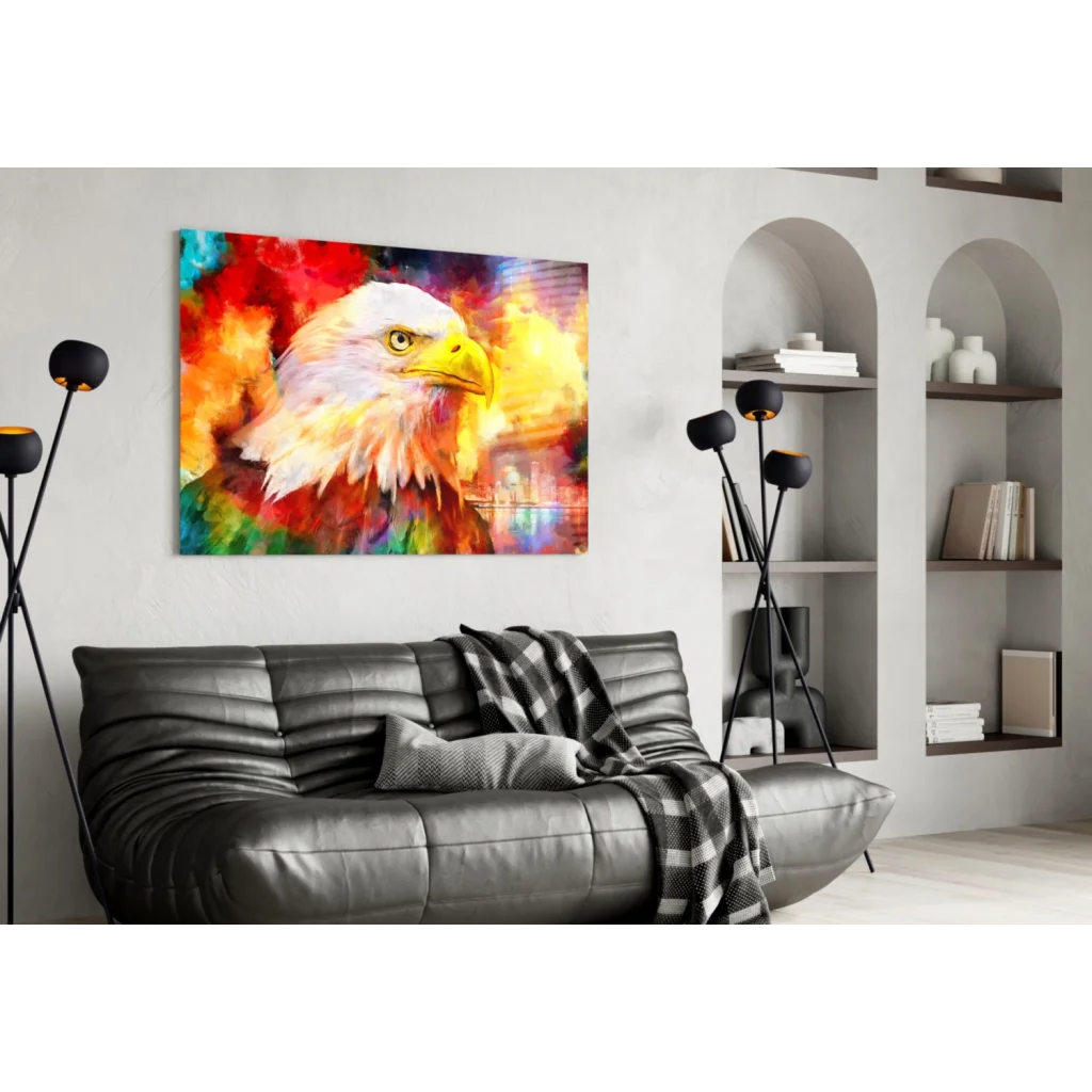 Vibrant Eagle glass wall art with modern black leather sofa and plaid throw