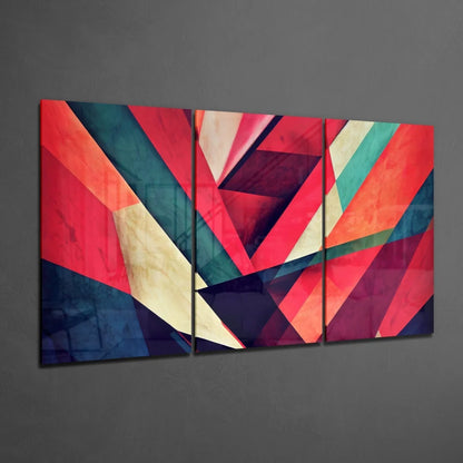 Vibrant glass wall art print with bold geometric shapes in reds, blues, greens, gold
