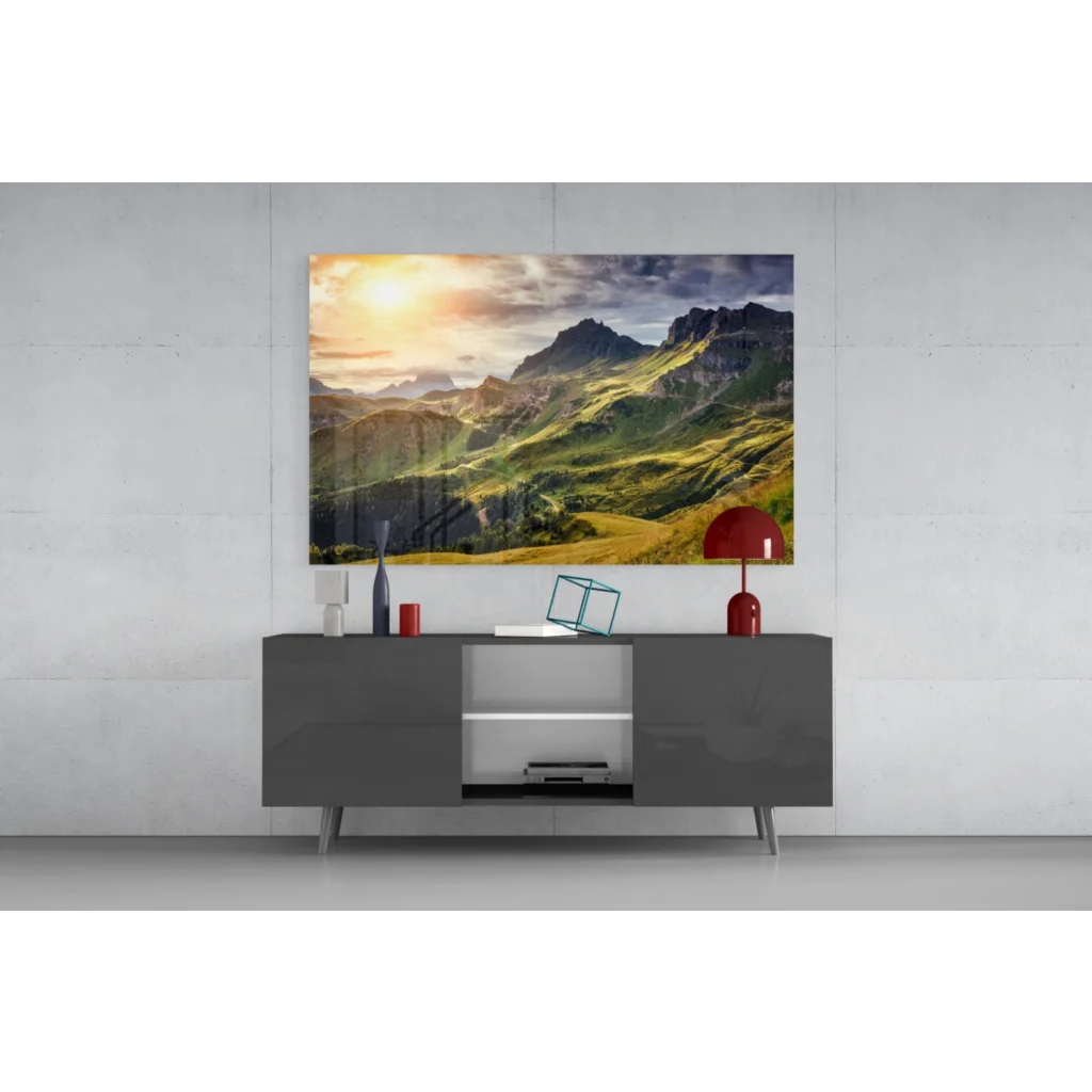 Modern gray sideboard with sleek silver legs and glossy finish below vibrant mountain sunrise wall art