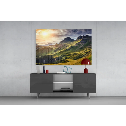 Modern gray sideboard with sleek silver legs and glossy finish below vibrant mountain sunrise wall art