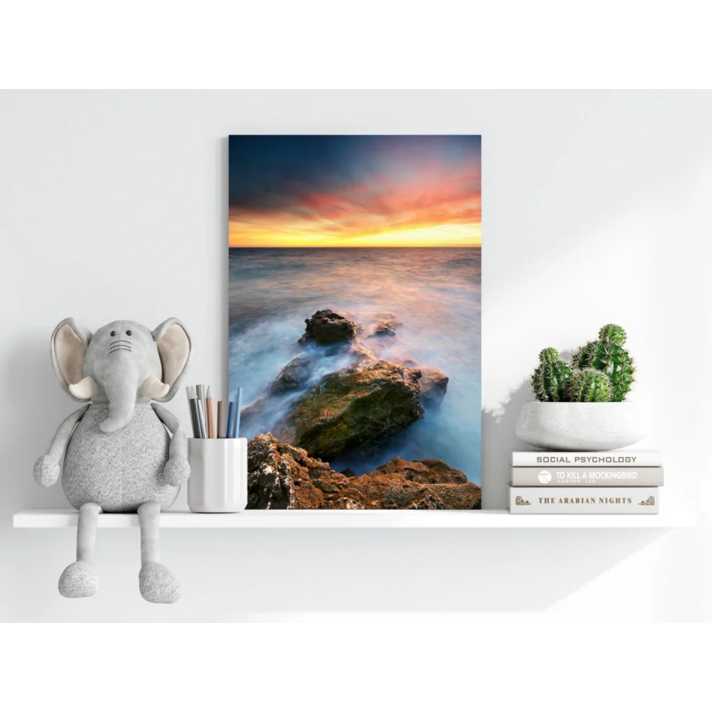 Gray elephant plush toy with textured fabric and white ears