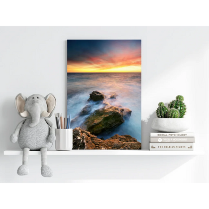 Gray elephant plush toy with textured fabric and white ears