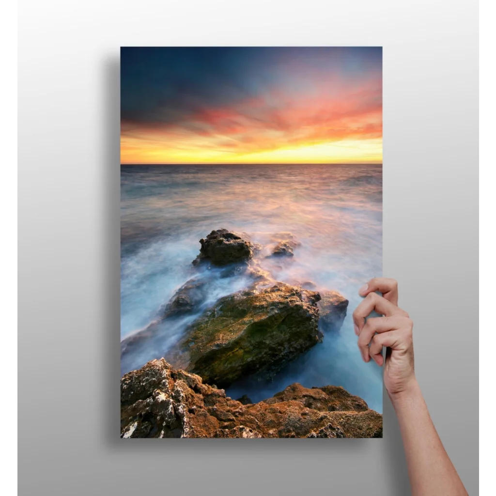 Vibrant ocean sunset canvas print with flowing waves on mossy rocks