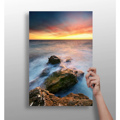 Vibrant ocean sunset canvas print with flowing waves on mossy rocks