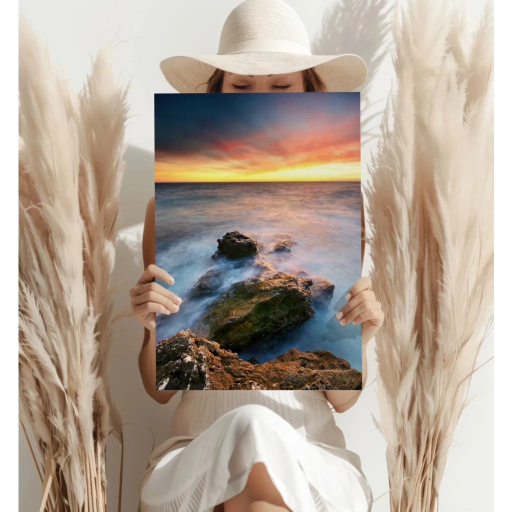 Vibrant ocean sunset canvas print with flowing waves and rugged rocks