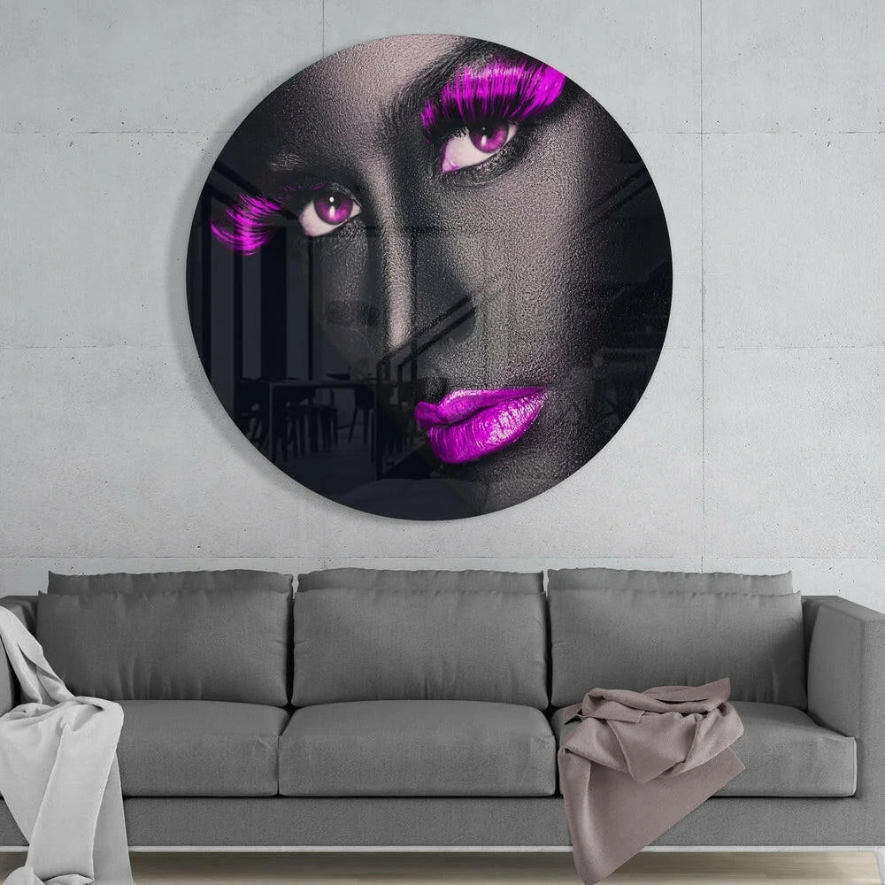 Round black and purple tempered glass art with bold pink eyes and lips