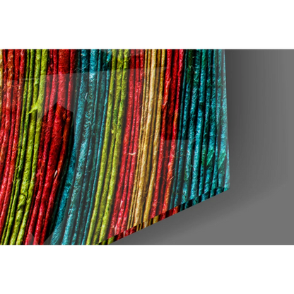 Vibrant rainbow spiral wall art canvas print in multi-colored textured fabric