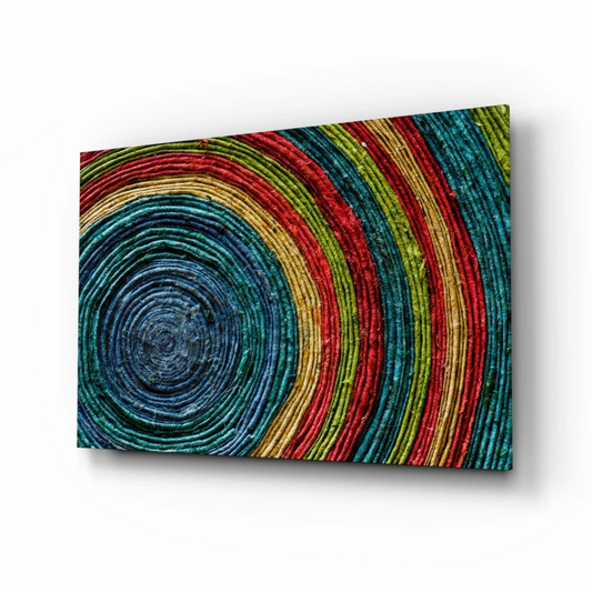Vibrant rainbow spiral wall art canvas print in reds, blues, greens, yellows