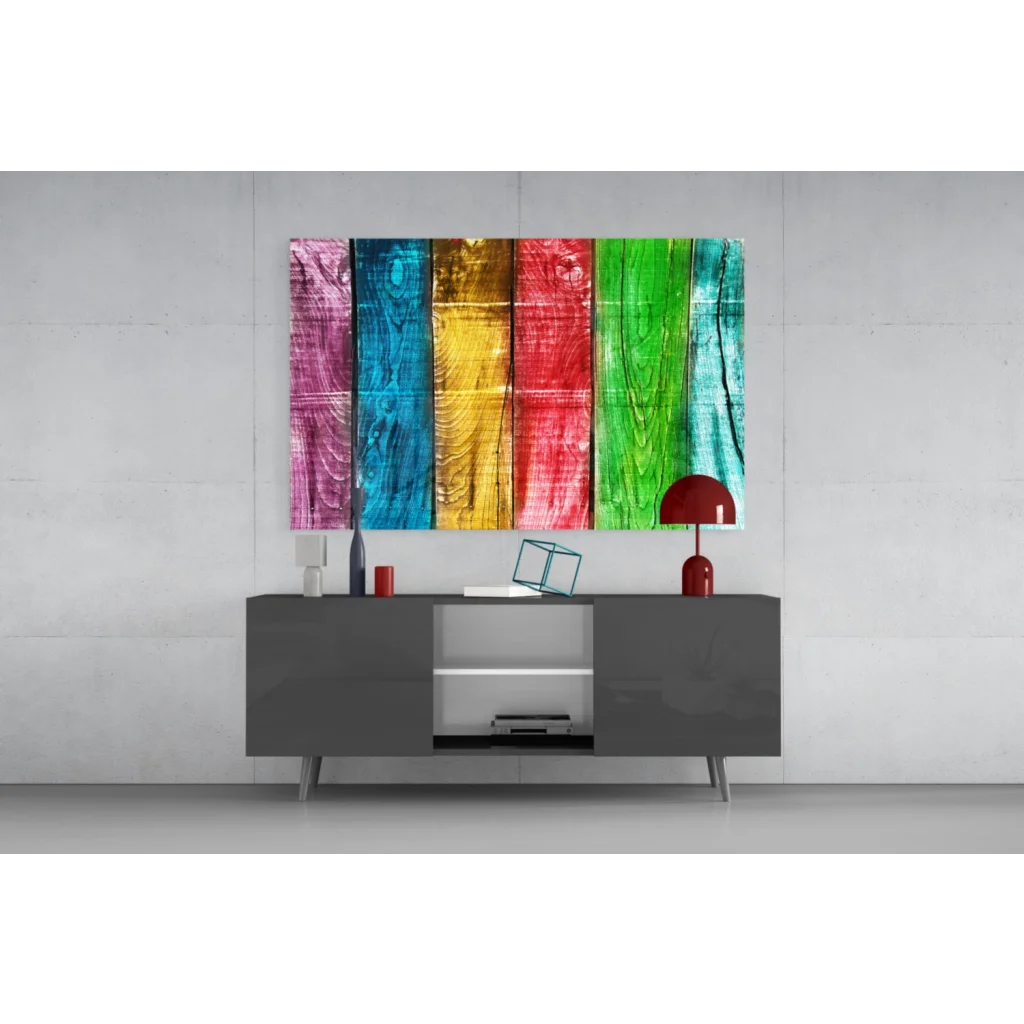 Vibrant rainbow wooden plank wall art with rustic texture above gray console