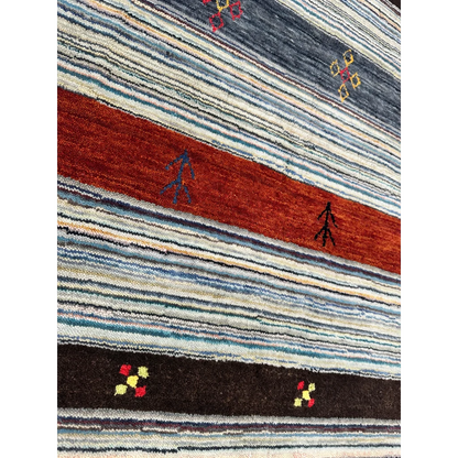 Vibrant Indo Gabbeh rug with blue-beige-rust stripes and bold geometric motifs