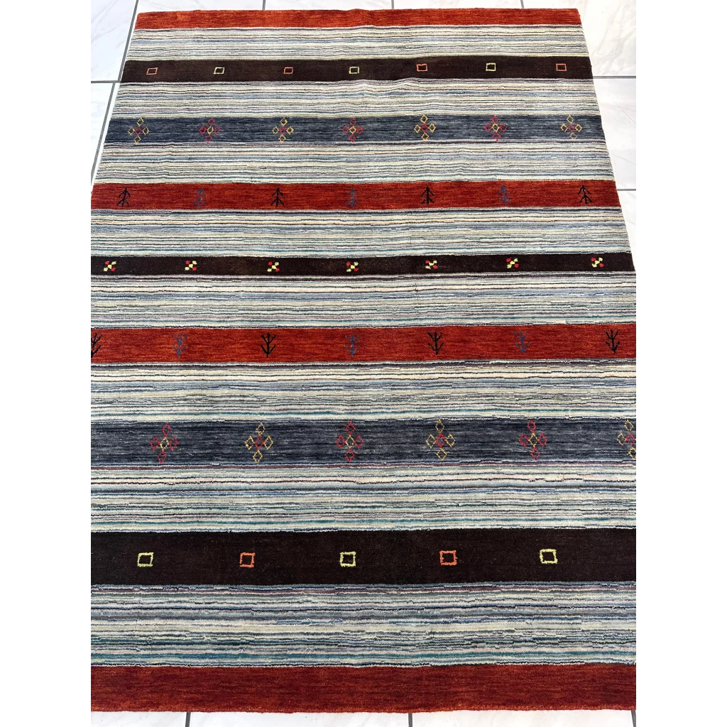Vibrant Indo Gabbeh rug with red blue gray black stripes and geometric motifs