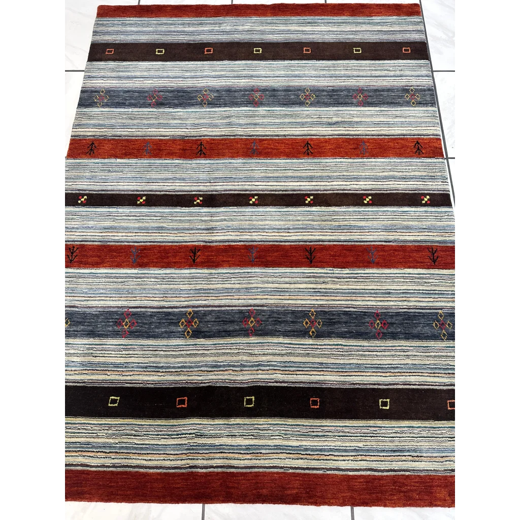 Vibrant Indo Gabbeh rug with red, blue, beige stripes and bold geometric motifs