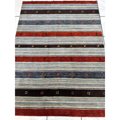 Vibrant Indo Gabbeh rug with red, blue, beige stripes and bold geometric motifs