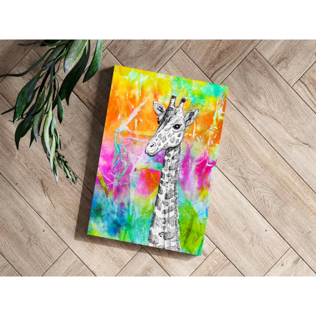 Vibrant tie-dye giraffe canvas wall art print on wooden floor