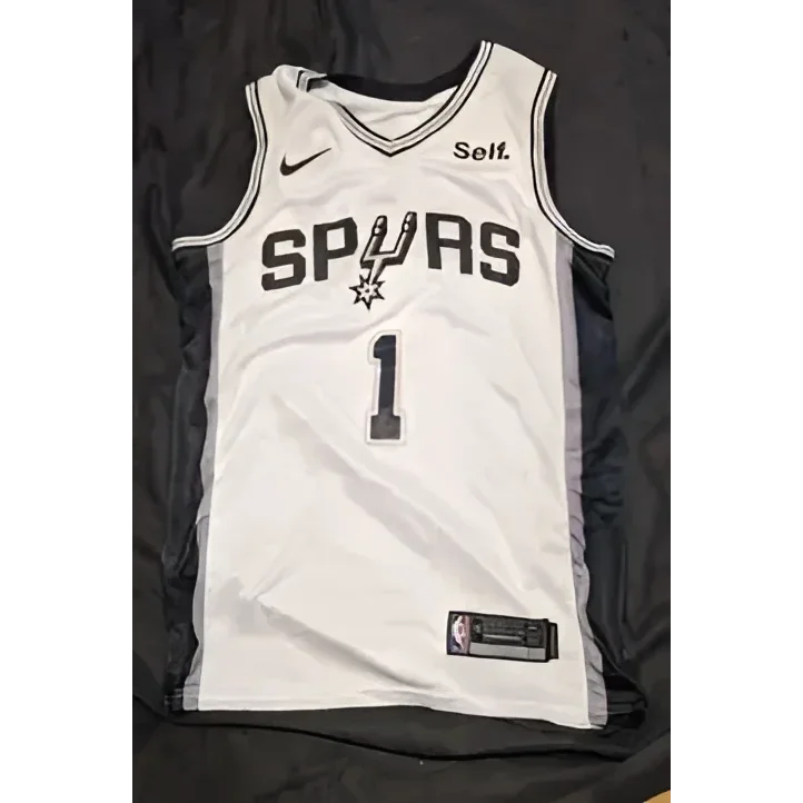 White Victor Wembanyama autographed jersey with black trim and lettering for San Antonio Spurs
