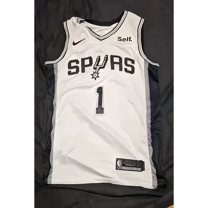 White Victor Wembanyama autographed jersey with black trim and lettering for San Antonio Spurs