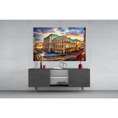 Vibrant glass wall art of cityscape with green copper roof at twilight